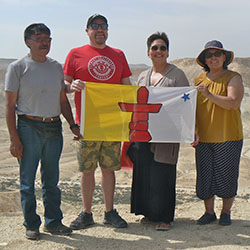 Inuit Students with Rev. Royal holding Inqaluit flag in Israel
