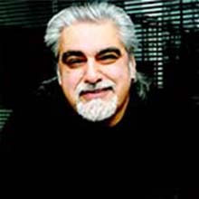Profile photo of Rick Tobias smiling in his office