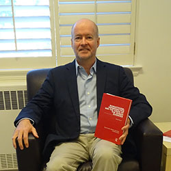 Dr. Massom with his book