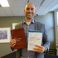 Dr. Reynolds with his books