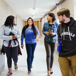 Students walking down hallway
