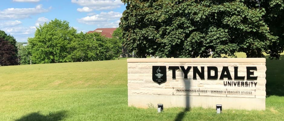 Tyndale University sign at the front of campus