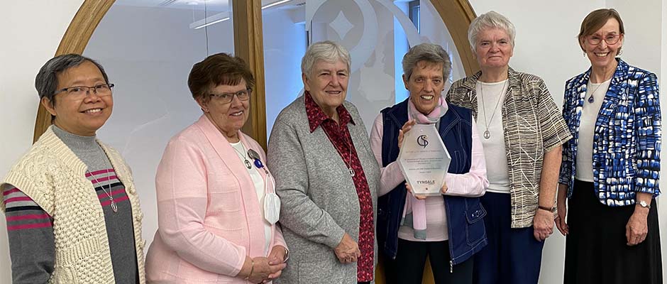 Sister of St Joseph awarded plaque with Marjory Kerr 