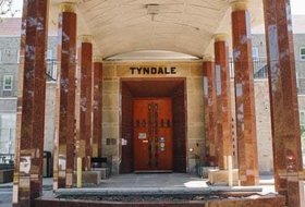 Six pillar front entrance of the Tyndale University campus
