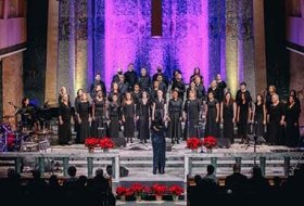 Wide view of the Tyndale Singers on stage during Christmas in the Chapel