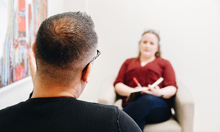 Two people discussing