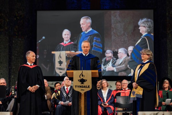 Dean Barry Smith presenting the Founders Scholarship to Rick Cunningham and Carla Nelson