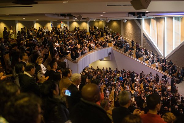 A full auditorium of family and friends
