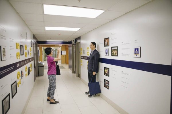 alumni with timeline wall
