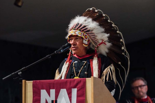 Man speaking at Podium
