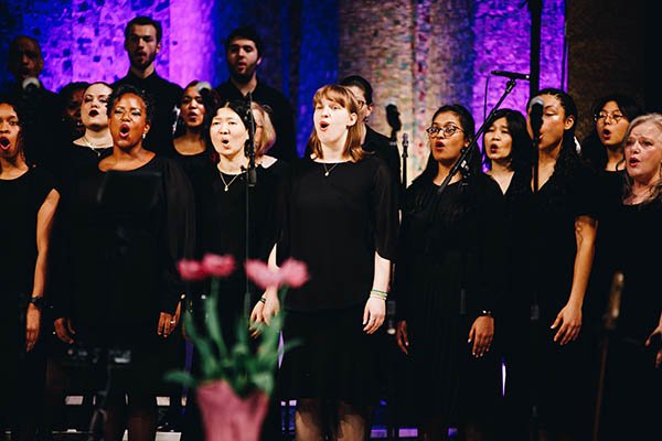 The Tyndale Singers singing on stage