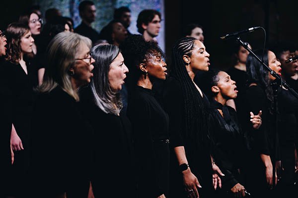The Tyndale Community Choir singing on stage