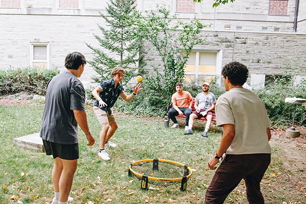 Students playing Spikeball