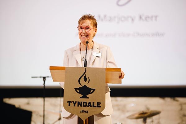 Majory Kerr addressing the Alumni