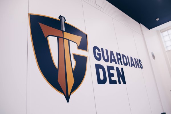Guardan's Den sign