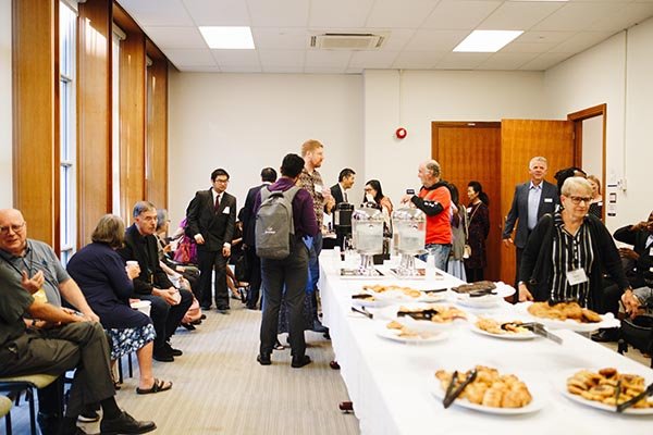 Alumni enjoying food with each other