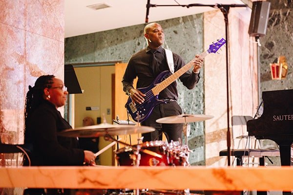 Drummer and Bassist playing music