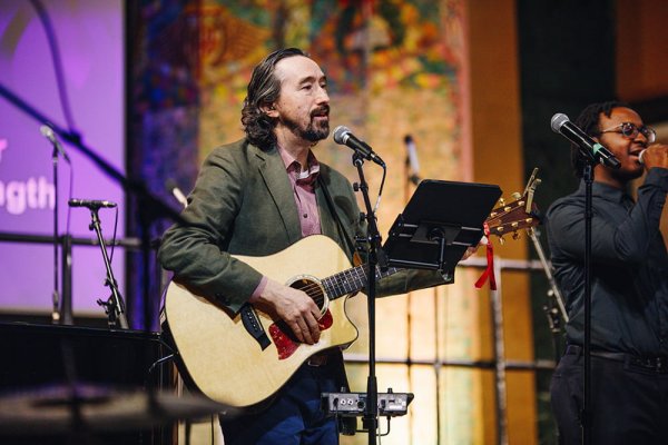 Ken Michell singing with Guitar