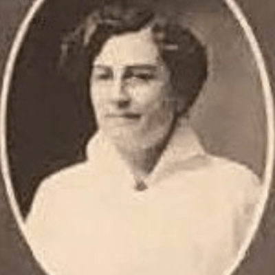 Cora M. Damude