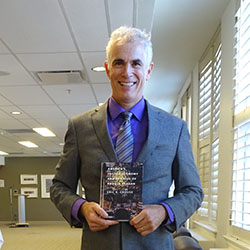 Dr. Crouse with his book